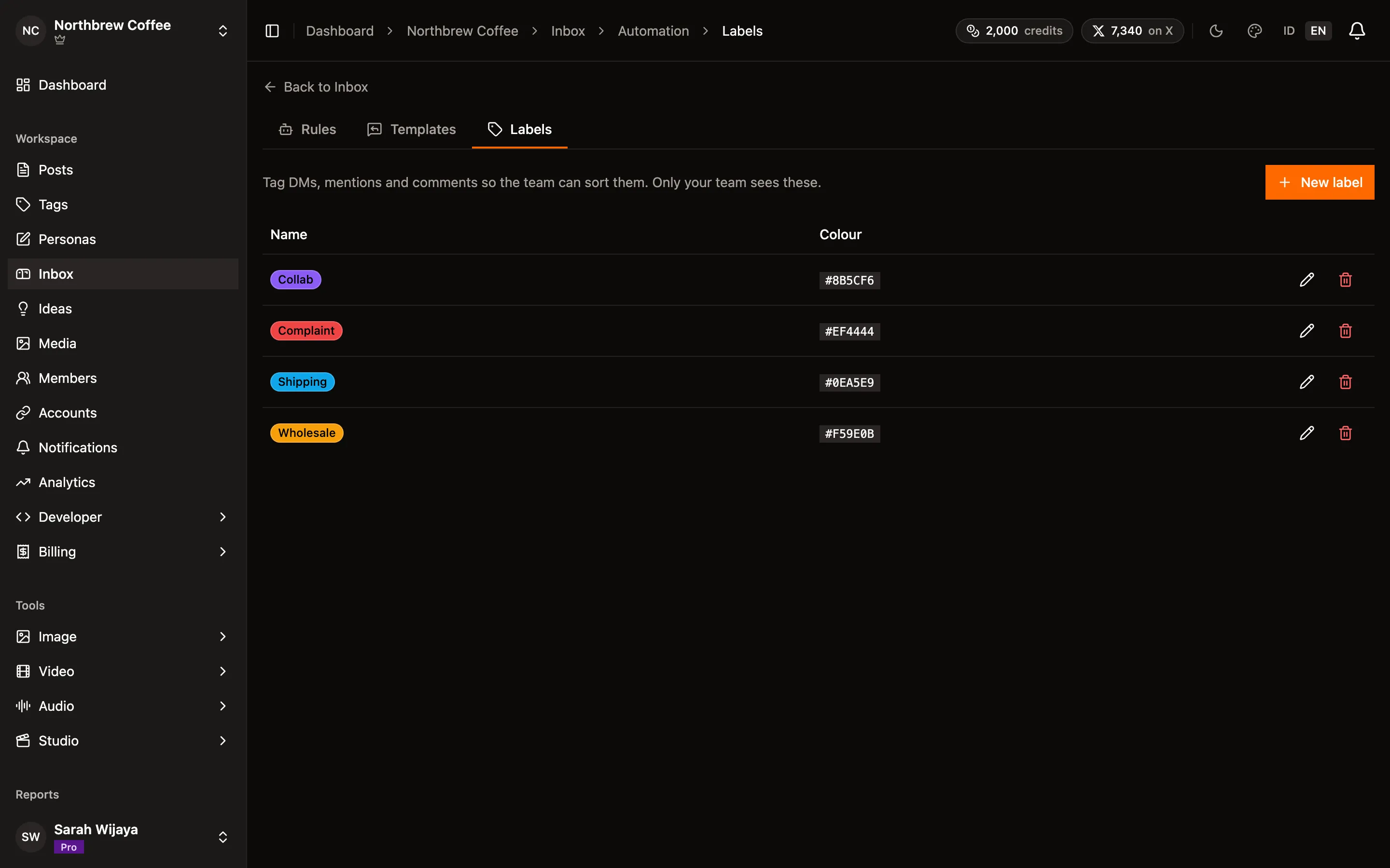 The Labels tab under Inbox automation, listing four labels with their colours.