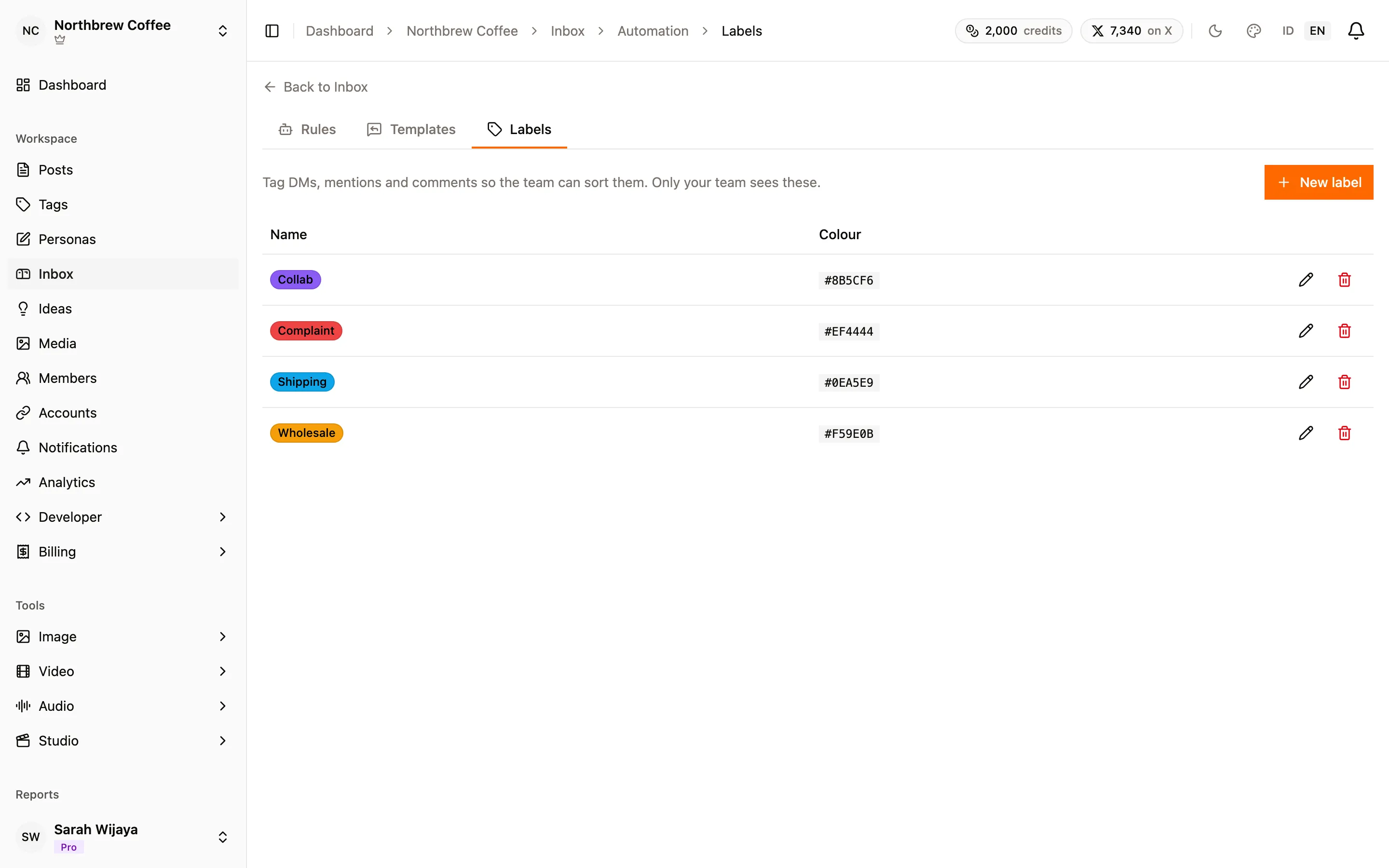 The Labels tab under Inbox automation, listing four labels with their colours.